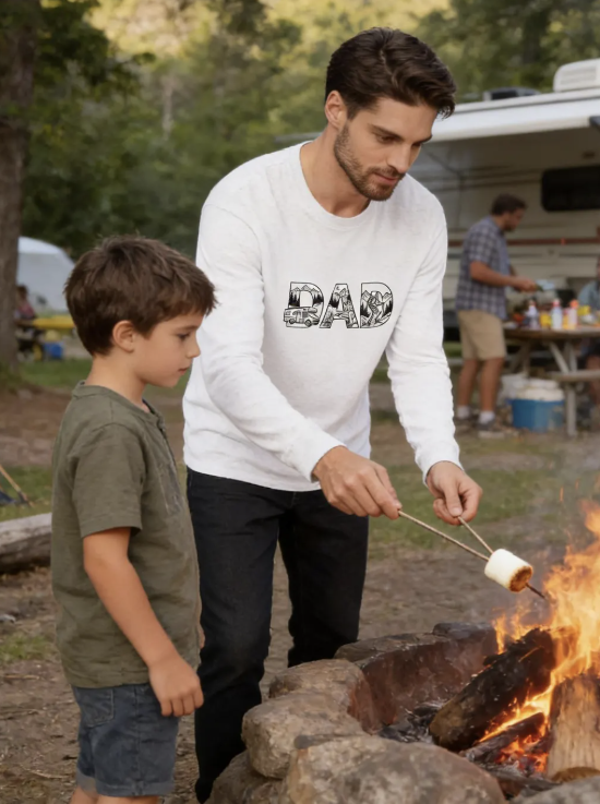 Dad in DAD long sleeve tee roasting marshmallows with son at the campsite